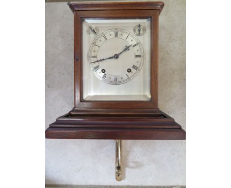 A good quality eight day mahogany bracket clock with bracket, striking on two gongs, the movement stamped W and H SCH 23 cm t