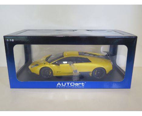 An Autoart performance die-cast, 1:18 scale model Lamborghini Murcielago LP670 4 SV, with original box and presentation case,