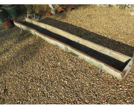 A long riveted galvanised feeding trough/planter with drainage hole - 280cm long 