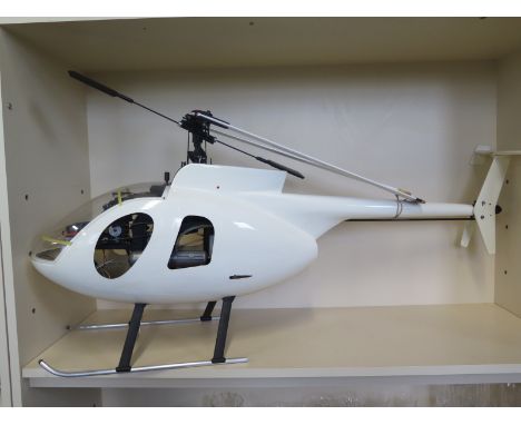 A ready to fly radio control helicopter Hughes 500 OS MAX 37 engine, 4' long - 1' 9 inches high, 4' 6 inches rotor span, 1' 1