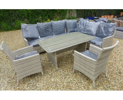 A Bramblecrest Bredon sofa set with casual table and two dining armchairs all in light grey coloured all weather wicker 