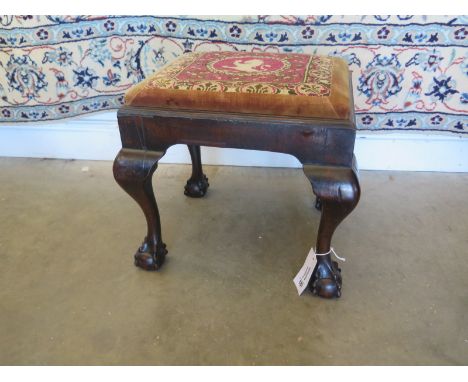A Victorian stool with embroidered cover, ball and claw cabriole legs - in clean polished condition 