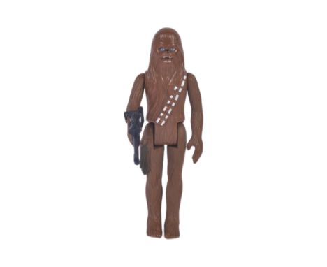 Star Wars - an original vintage Kenner / Palitoy made action figure ' Chewbacca '. 100% complete, with original. GMFGI 1977 H