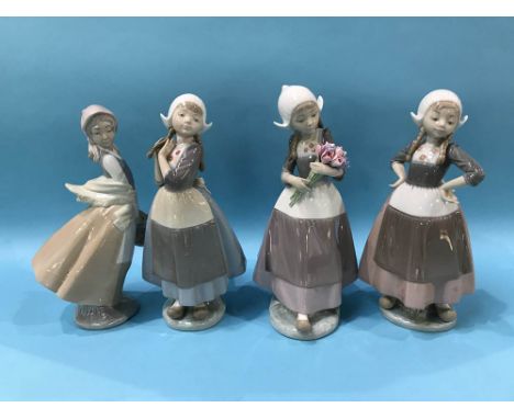 Three Lladro Dutch figures and a Nao figure