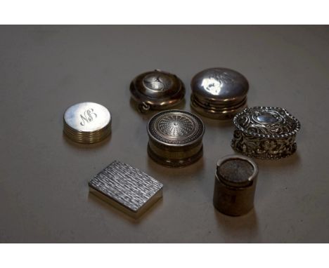 A silver engine turned coin case; together with six various silver boxes.