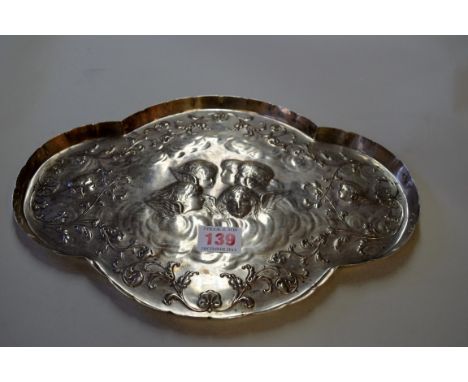 An Edwardian silver dressing table tray, by W Comyns, London 1902, decorated angels and floral scrolls, 30.5 x 22.5cm, 338g. 