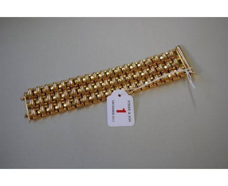 An 18ct gold link cuff bracelet, stamped 750, 18.6cm, 72g. Condition Report: Overall condition good, minor denting in places 