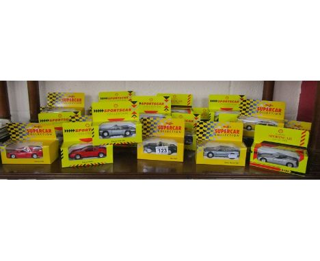 Collection of boxed model sports cars