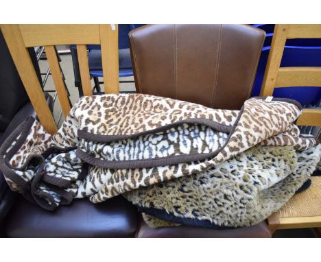 TWO LEOPARD PRINT BLANKETS