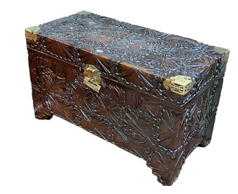 Oriental carved and brass bound camphorwood trunk, 60cm by 100.5cm by 49.5cm. (locked but no key)