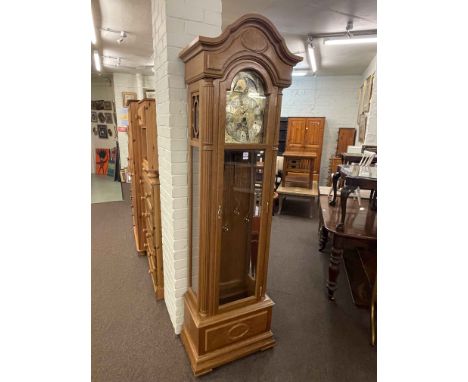 Kieninger oak cased triple weight longcase clock having arched moon phase dial, 208cm.