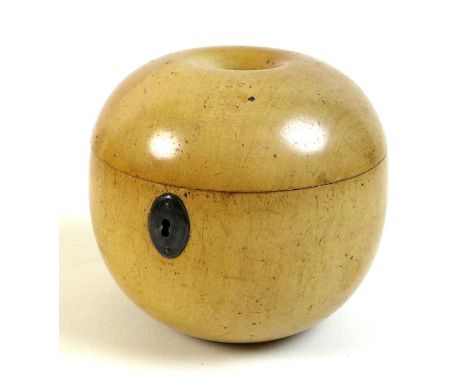 An early 19th century turned fruitwood tea caddy in the form of an apple, a/f missing stalk finial, possibly Scandinavian, wi