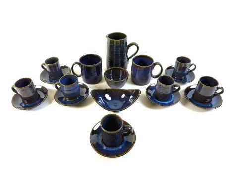 Stephanie Kalan (1909-1978): a studio pottery part coffee set, comprising seven coffee cups, seven saucers, a sugar bowl and 