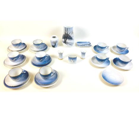 A part set of Bing & Grondahl Seagull pattern tea service, comprising six gilt rimmed trios, four tea cups and saucers, a lon