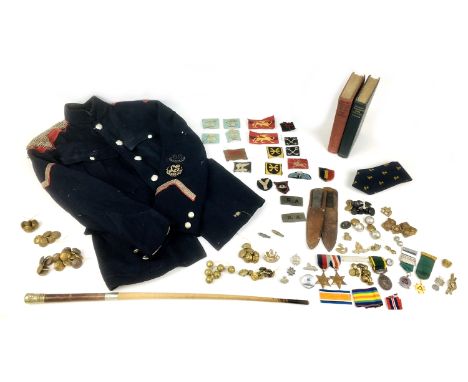 A collection of militaria, comprising a WWII medal group France and Germany Star, 1939-1945 Star, amd Territorial Efficiency 