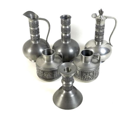 A group of six pieces of Norwegian pewter, comprising a candlestick, unmarked, a lidded ewer, stamped Pewter Haugrud Norway, 