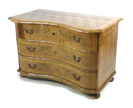 A good Continental serpentine fronted commode, 19th century, possibly Swiss or Austrian, walnut veneered over pine, with inla