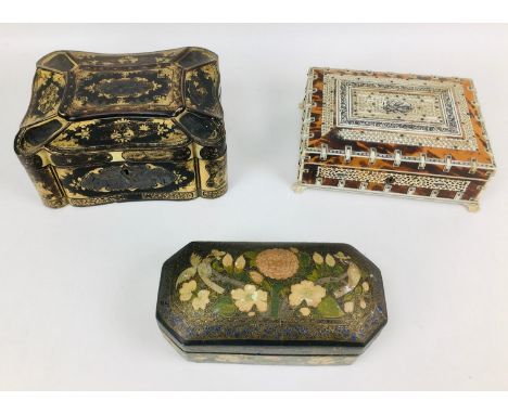 Three various Middle and Far Eastern early 20th century and later boxes, comprising a Middle Eastern papier mache scribe's ca