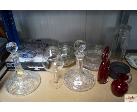 A Whitefriars ruby red glass swan ornament; a Whitefriars ruby red glass baluster jug; a storage jar, a ships decanters, and 