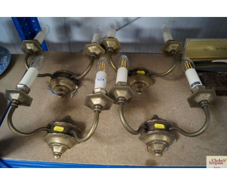 Two pairs of two branch wall light fittings