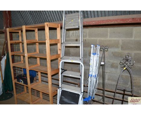 An aluminium step ladder and another step ladder