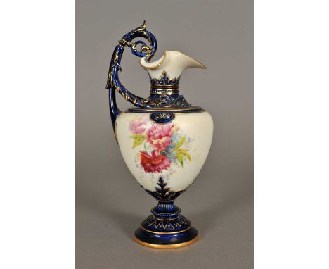 A Royal Worcester blush ivory and cobalt ewer dated 1897, ewer with acanthus leaf handle decorated with floral sprays, raised