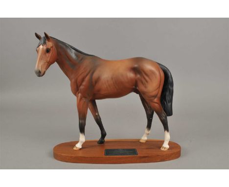 A Beswick Connoisseur model of the racehorse Troy, mounted to a wooden plinth with titled plaque, 29cm hgih