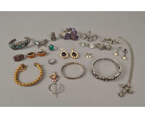 A collection of costume jewellery, to include; an amethyst and white metal 'grape bunch' brooch, an opal ring, a marcasite fl