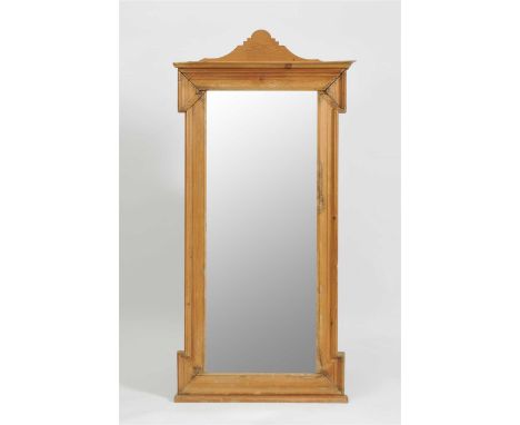 A small Victorian stripped pine wash stand, with a central frieze drawer, raised on turned column supports over a shaped plat