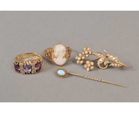 A 9ct gold amethyst ring, together with a cameo ring stamped '9ct', a split seed pearl set spray brooch, stamped '9ct' and a 