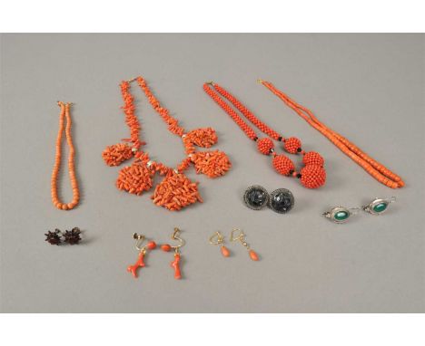 A collection of coral jewellery, comprising; two graduated bead necklaces, a stick coral necklace, a multi bead necklace, a p