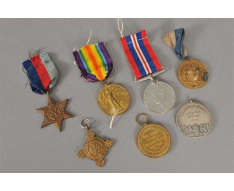 A small collection of British medals comprising two WWI Victory medals awarded to 33413 Pte. H.J. Haynes – Worc. R. and 24500