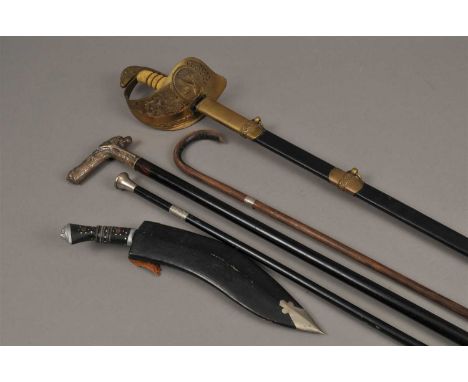 An RAF dress sword together with a turned ebony walking cane with a shaped white metal handle decorated with sporting motifs,