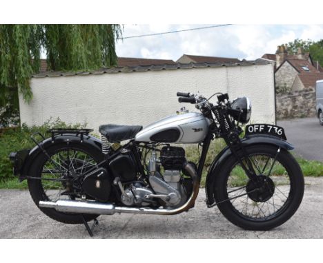 A 1946 BSA M20, registration number OFF 736, silver.  The BSA M20 saw its debut in 1937.  The large side valve engine 496cc M