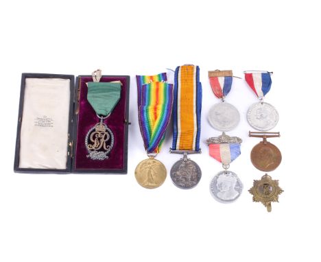 A collection of WWI medals awarded to Lieutenant Commander Charles Davidson RNR. Comprising a hallmarked silver George V Roya