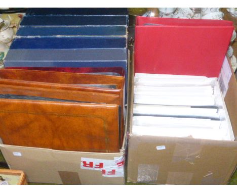 Large collection in two boxes of GB First Day covers in nine albums and loose