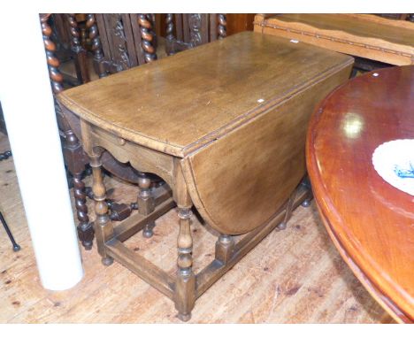 Period style oak gate leg dining table on turned legs