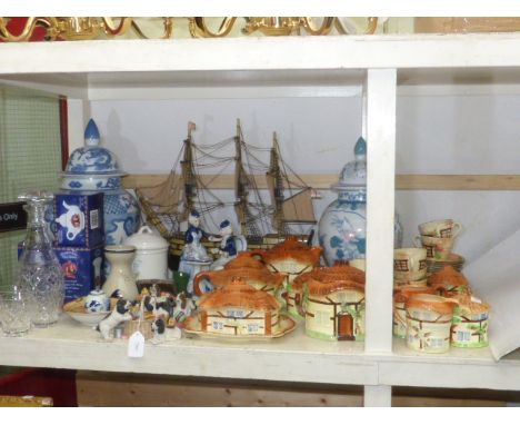 Model galleon, two large lidded vases, cottage teaware, glass decanter and glasses, etc