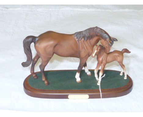 Royal Doulton group of mare and foal 'First Born' on wood plinth