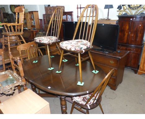 Ercol extending dining table, four Quaker back chairs, open topped double corner cabinet and wall rack (7)