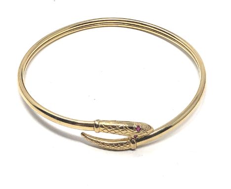9ct gold ruby set eyes snake bangle (10.5g), good overall condition, would benefit from a clean