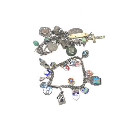 Selection of Vintage charms includes silver etc 