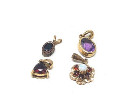 4 x 9ct gold opal, amethyst &amp; garnet pendants 