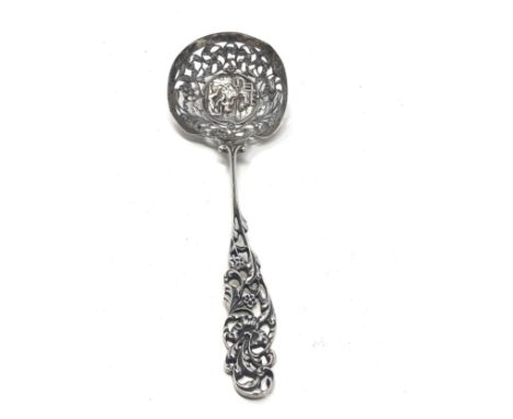 Antique dutch silver shifter spoon central embossed panel measures approx 21cm long 