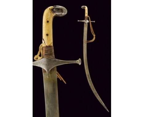 dating: 19th Century provenance: Persia, Curved, flat, single-edged blade, in damask (barely visible), the base with a cartou