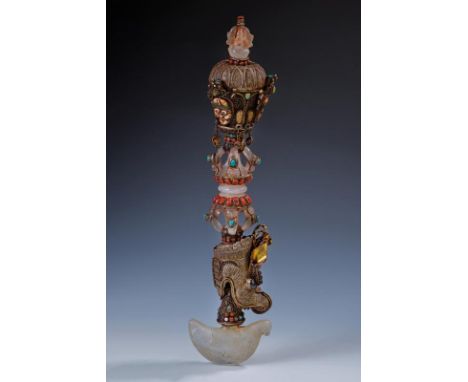 dating: 19th Century provenance: Tibet, The thick, symbolic blade in rock crystal, strongly convex and with a curl on one sid