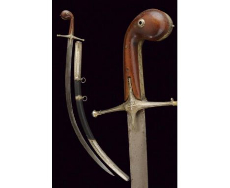 dating: Mid 19th Century provenance: Turkey, Curved, flat, single-edged blade, in fine damask; silver hilt with cross-quillon
