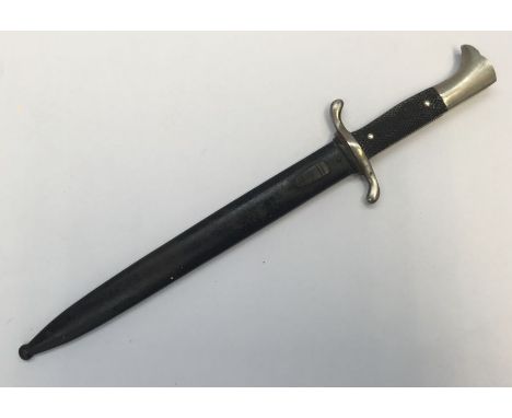 A WW2 era German fireman’s dress dagger, with associated scabbard, Carl Eickhorn of Solingen. Nickel plated pommel, chequered