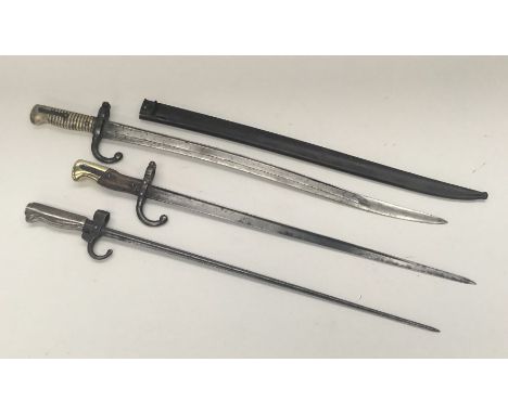 3 19th century French sword bayonets. To include, a M1886 Lebel, with hooked quillon and cruciform blade (no scabbard). A Gra