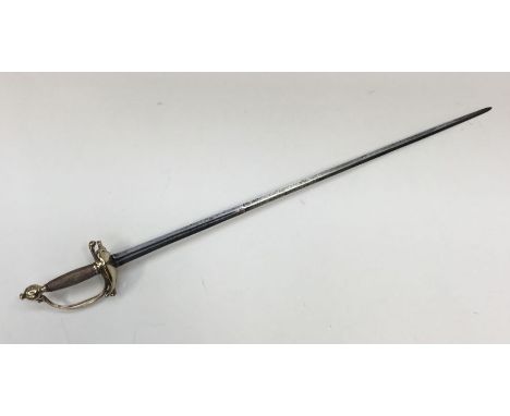 An 18th century continental rapier sword, with brass clamshell guard, knuckle bow and pommel. Copper twisted wire binding to 